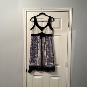 Strappy floral pattern dress, worn once to wedding. Hits just above knee. Sz 14P
